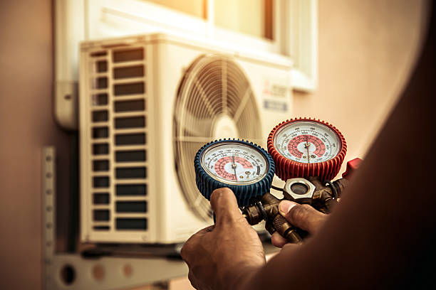 Professional Hvac technician working in Hampton, MD